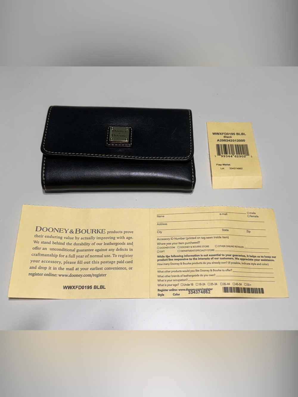 Dooney & Bourke Black Leather Flap Wallet